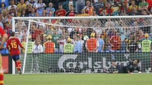 Spain's Ramos scores a goal against Portugal's goalkeeper Patricio during penalty shoot-out at their Euro 2012 semi-final soccer match at Donbass Arena in Donetsk